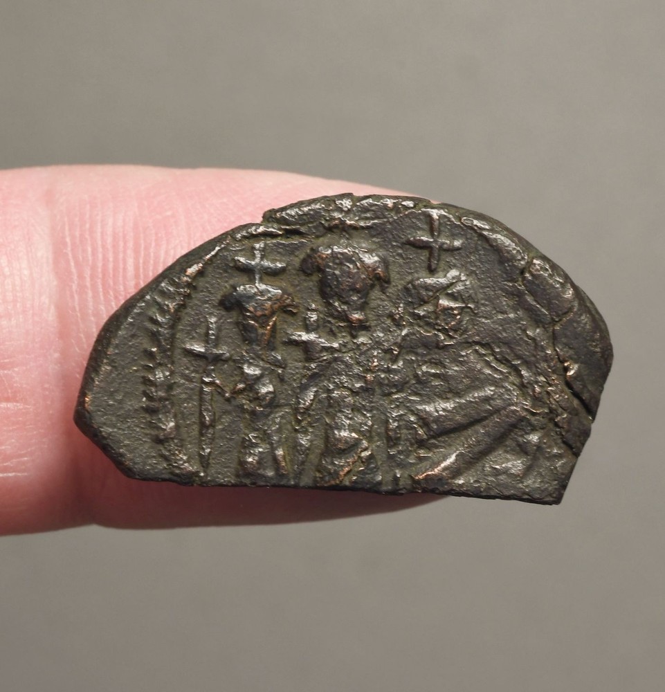 IS56-79 Earliest type Arab-Byzantine AE fals, time of Rashudin, c. 638-643AD